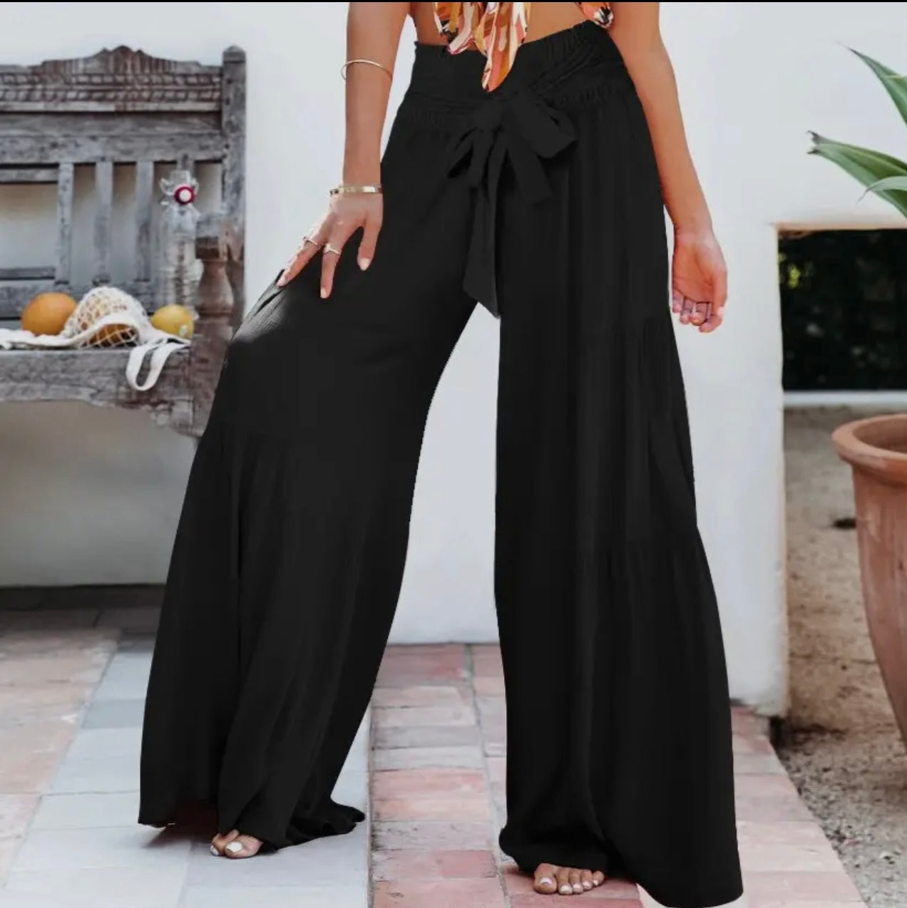Wide-Leg Pleated Trousers